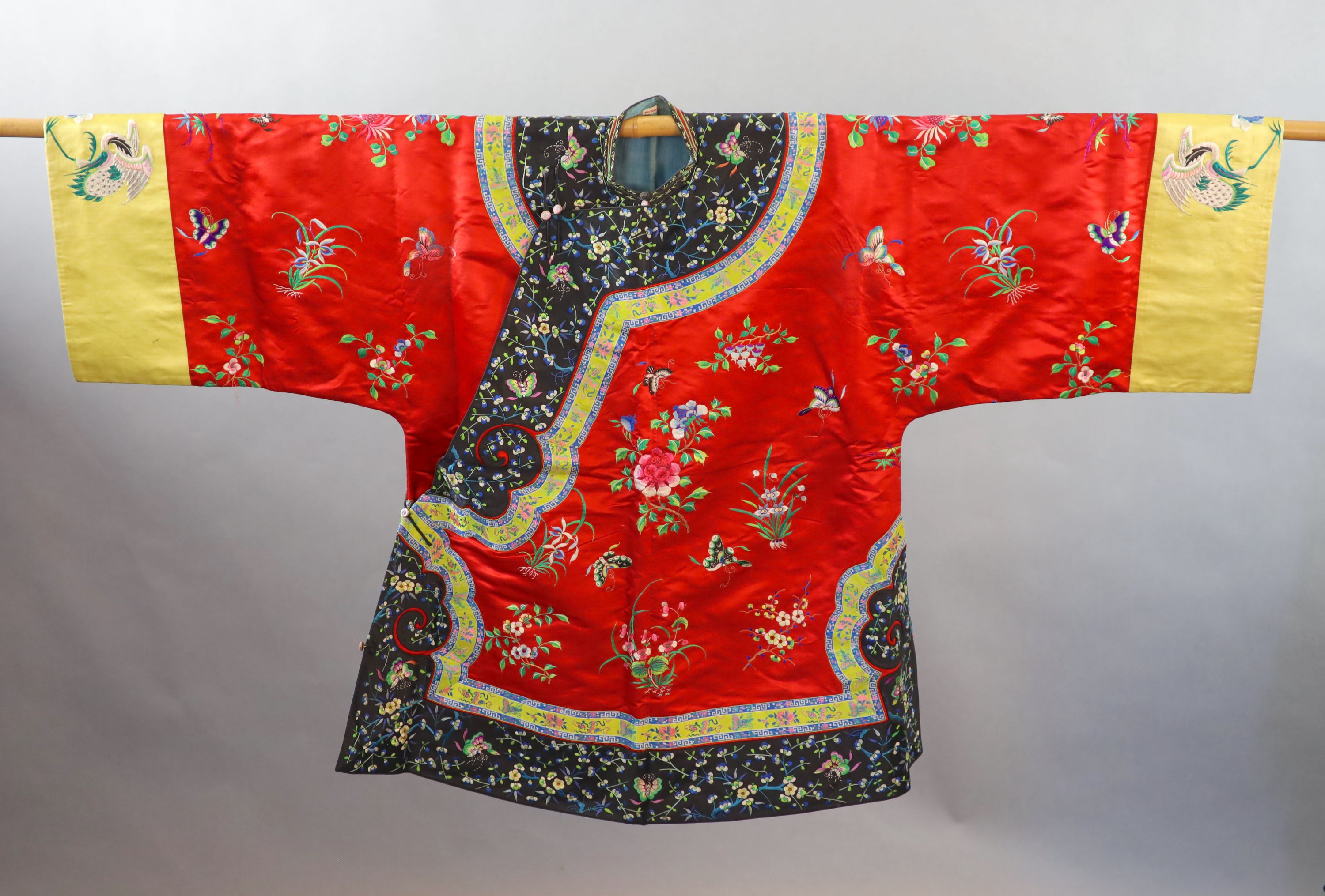 A Chinese red silk robe, early 20th century